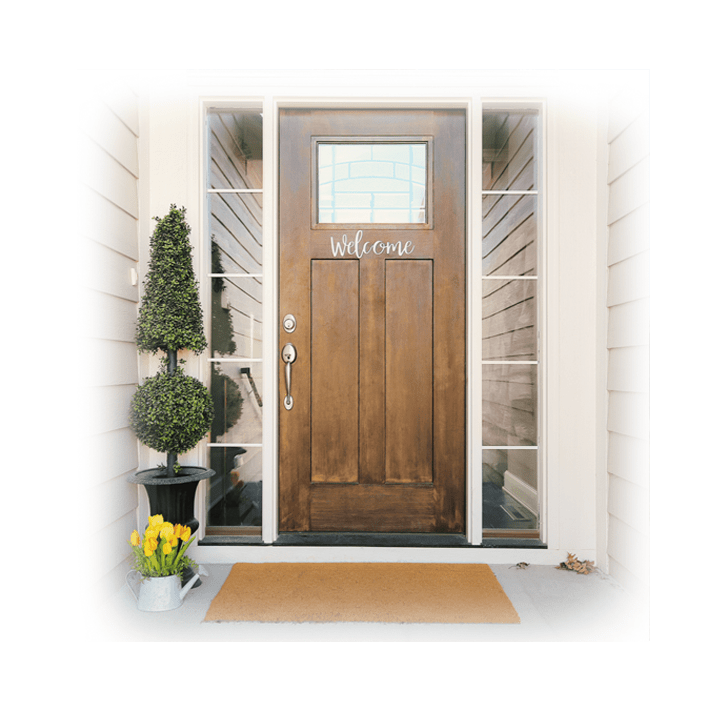 image of front door with decorative topiary and flowers